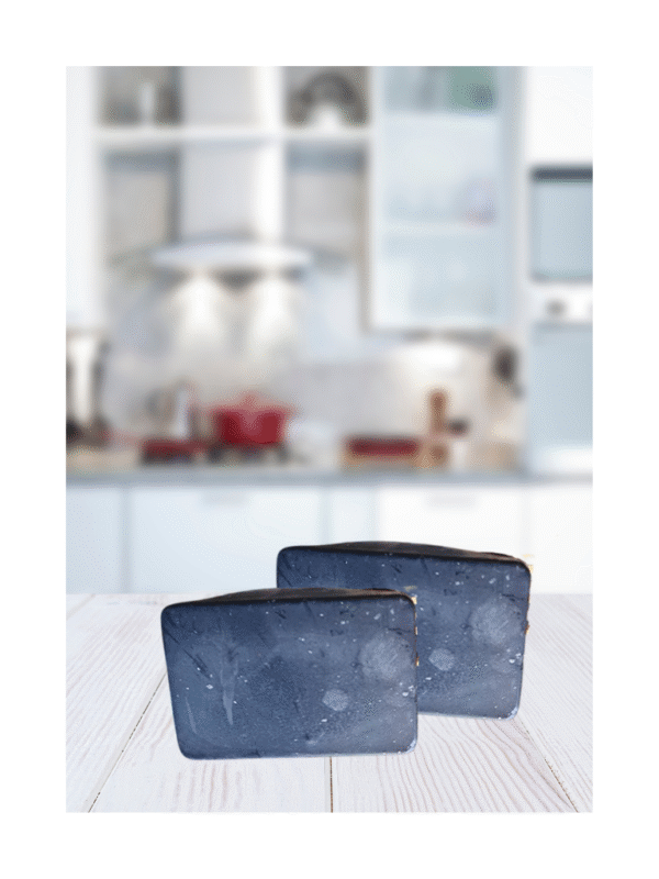 Handmade charcoal detox soap bar made with jojoba oil, coconut oil, olive oil, castor oil, and palm oil, designed for deep cleansing and nourishing skin.